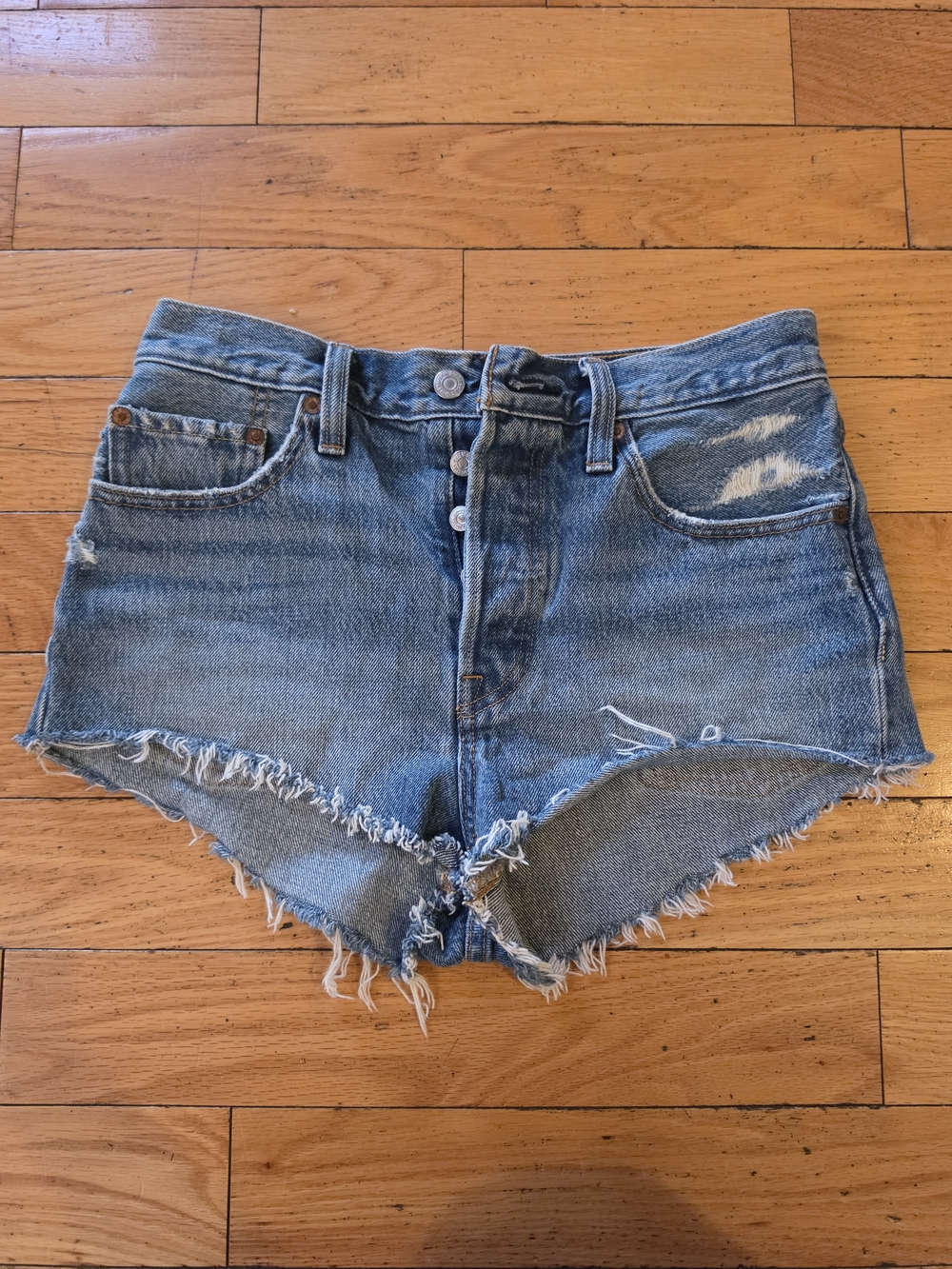 Levi's Distressed Light Blue High-Rise Denim Shorts